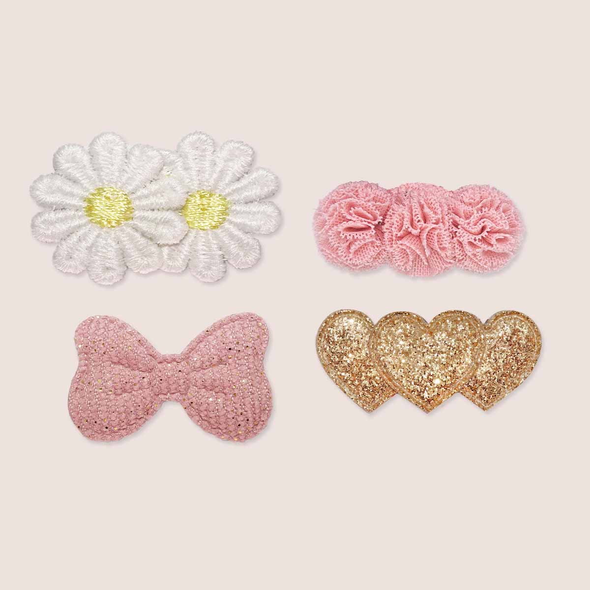 Haarspeldjes met madeliefjes, roze bloemetjes, strikje en hartje